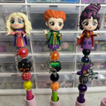 Three Hocus Pocus Sanderson Sisters beaded pens with chibi character toppers and Halloween charms